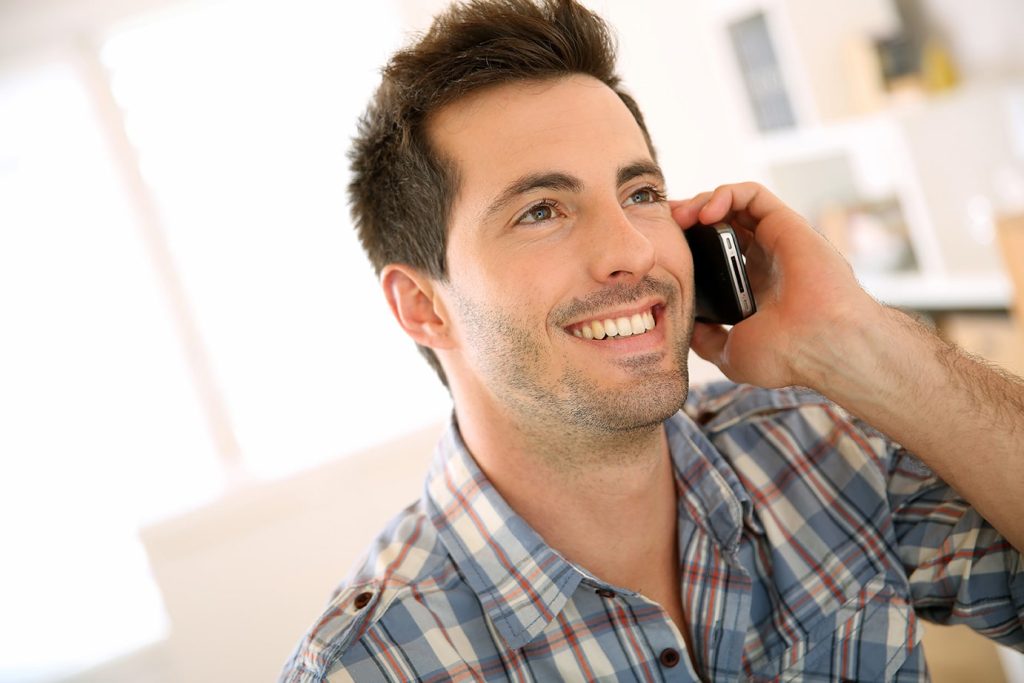 Men Talking on Phone